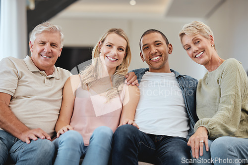 Image of Family, portrait and relax in living room home, bonding and having fun. Interracial love, diversity and care of happy grandparents, man and woman, smiling and enjoying quality time together in house.