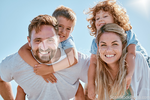 Image of Happy family, portrait and piggy back in summer sunshine, smile and happy for bonding, relax and freedom. Family, happiness and children with mom, dad and love on holiday adventure with sky in Cancun