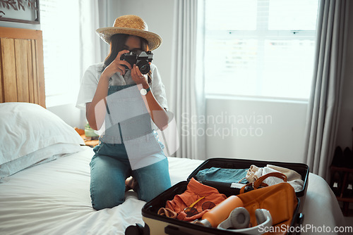 Image of Woman, photographer or camera picture of suitcase for summer holiday, vacation break or content marketing for creator blog. Travel influencer, digital photography or luggage objects in hotel bedroom