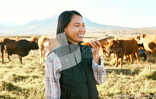 Image of Asian woman, farm and phone with smile for communication, travel or conversation in the countryside. Happy Japanese woman smiling on farming trip on call or speaker on smartphone for agriculture