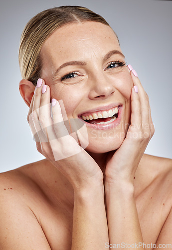 Image of Skincare, beauty and woman in studio portrait for cosmetics, makeup and facial wellness with hands for manicure, luxury and spa. Face of a happy woman model with dermatology skin care and health