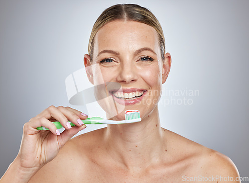 Image of Dental, brushing teeth and smile with portrait of woman for beauty, whitening and morning routine. Cleaning, oral hygiene and fluoride with face of model and toothpaste for health and tooth care