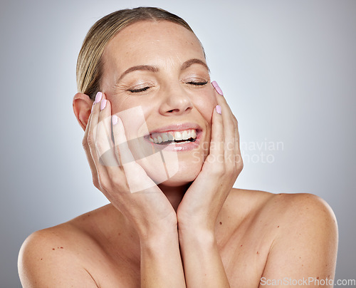 Image of Face, hands and skincare of woman with eyes closed in studio isolated on a gray background. Makeup, cosmetics and beauty aesthetics of female model with manicure feeling happy with facial treatment.