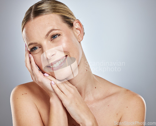 Image of Face, beauty makeup and skincare of woman in studio isolated on a gray background. Aesthetics, natural cosmetics or happy female model thinking about spa facial treatment for wellness or healthy skin