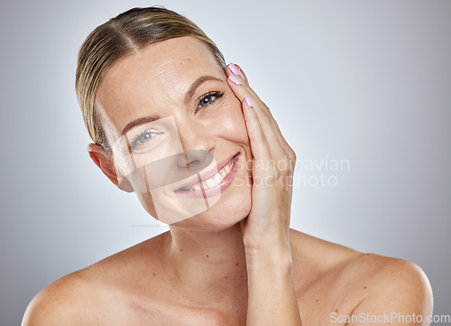 Image of Skincare woman in studio portrait happy with natural makeup, cosmetics and clean facial for glow, shine and foundation marketing. Face of a young model with smile for dermatology results or benefits