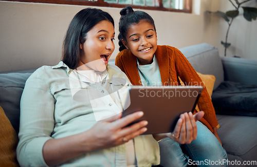 Image of Tablet, pregnant mother and girl on technology looking at children education development app. Learning video, relax and happy family together on a home living room sofa watching a cartoon with mama