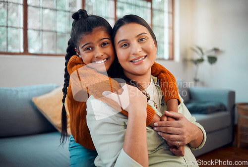 Image of Pregnancy, hug and child with mother, love and peace in the living room of their home. Affection, happy family and portrait of a pregnant woman with a girl kid hugging during maternity leave