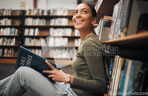 Image of Student, thinking and reading books library floor for knowledge, college education and research planning. University bookshop, young girl learning and happy vision for scholarship or study for exam