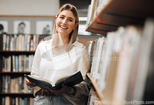 Image of Student, reading or books in library on school, university or college campus for education, study research or learning. Portrait, smile or happy woman, textbook or bookshelf information for homework