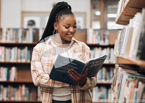 Image of Black woman, library and reading for knowledge, education and relax. Nigerian female, girl and student read book, bookstore and research for task, smile and enjoy free time with literature and study.