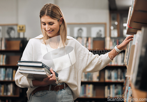 Image of Woman, books and library to search for choice of author, writer or literature education for reading and learning at college. Happy university student with book for research on a bookstore shelf