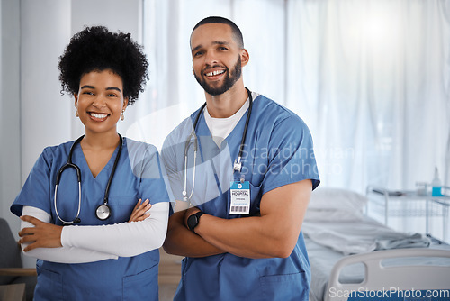 Image of Doctor, portrait smile and arms crossed at hospital with vision for healthcare, phd or cardiology team. Happy medical experts standing in confidence for teamwork, health checkup or medicare at clinic