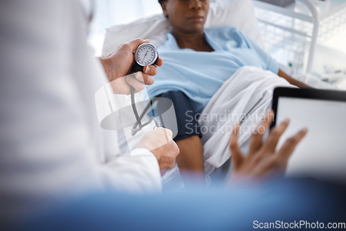 Image of Blood pressure, hypertension and doctor with patient to check diabetes, healthcare consulting and service in clinic. Closeup of surgeon hands measure arm pulse, test and medical wellness for surgery