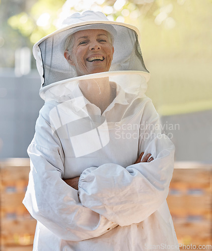 Image of Beekeeper farmer and happy portrait of woman with cheerful smile in expert ppe and safety uniform. Happiness, pride and confidence of mature beekeeping person in suit for protection on farm.