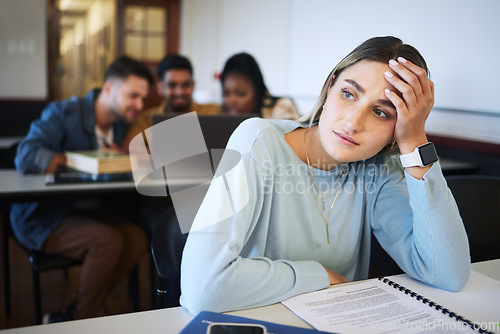 Image of Stress, education and study with woman in classroom for exhausted, mental health and anxiety in college. Learning, books and exam with girl university student for fatigue, tired and burnout in school