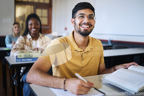 Image of Study, classroom and students with education, learning and knowledge for exam, test and assessment in language writing. Books, notebook and happy university student with smile for diversity in class