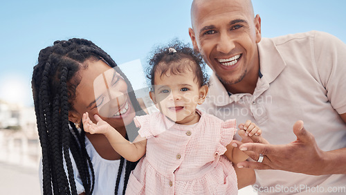 Image of Happy family, mother and father with a baby at a beach for summer holiday, vacation or weekend in Rio de Janeiro. Relaxing, mom and lovely dad smiles enjoying fun quality time with newborn in Brazil