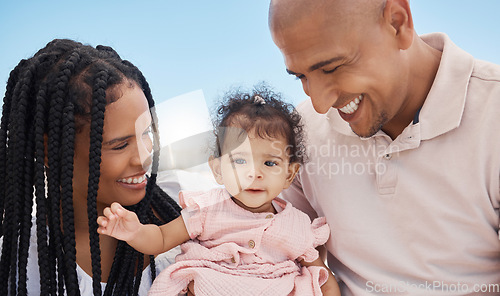 Image of Mother, father and baby in nature as a happy family on summer holiday vacation in Rio de Janeiro, Brazil. Relaxed father, mom and cute newborn girl love enjoying fun quality time or bonding at beach