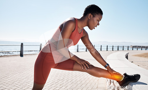 Image of Fitness, pain or black woman with shin injury from running accident in training, exercise or outdoor workout. Bad, emergency or injured girl sports athlete with leg problems suffering from hurt bone