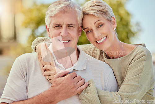 Image of Portrait, love and retirement with a senior couple hugging outdoor in nature together during summer. Happy, smile and park with an elderly man and woman pensioner bonding outside on a romantic date