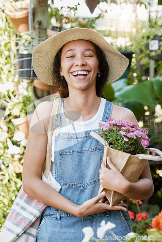 Image of Flowers, happy and woman at a plant nursery shopping for floral products for her garden in nature. Happiness, smile and young female florist from Mexico buying a flower bouquet at sustainable market.