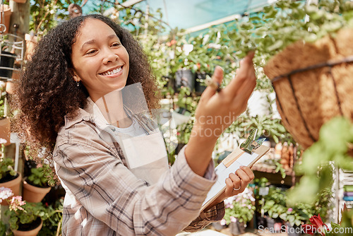 Image of Plant, nursery and woman worker with checklist doing quality assurance on farming stock. Sustainability, small business and growth, happy florist startup manager in commercial garden checking plants.