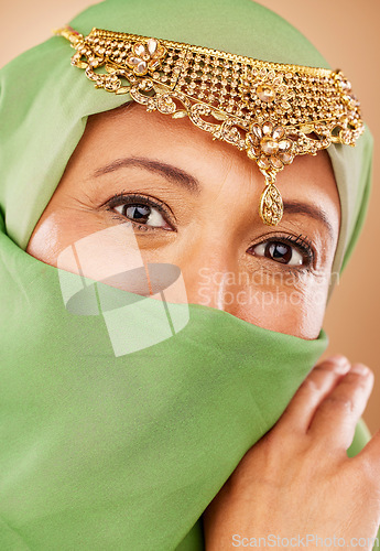 Image of Eyes, hijab and Muslim, woman with Islamic fashion and face zoom with veil and jewelry, beauty and microblading portrait. Cosmetic lens, religion freedom and wellness with fashion model and vision.