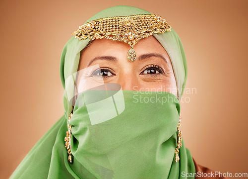 Image of Portrait of woman with hijab, jewelry and bridal gold head piece for luxury wedding celebration in Iran. Beauty, religion and bride with Arab fashion, makeup and golden jewellery for muslim marriage
