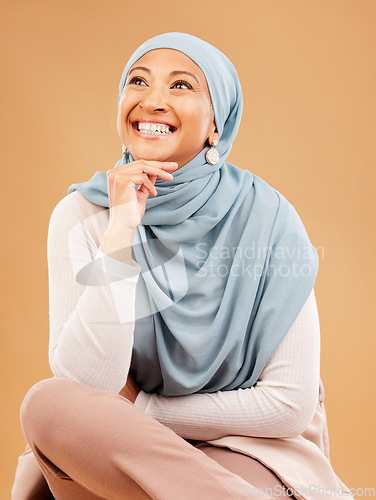 Image of Muslim, fashion and woman in studio thinking of hijab beauty, makeup ideas and cosmetics with mockup and smile. Happy islamic model with designer fabric, silk and inspiration for Arab culture