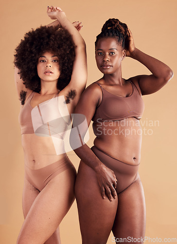 Image of Body positive, empowerment and black women with body hair for natural beauty, care for skin and confidence on brown studio background. Self love, wellness and African model friends with hairy armpit