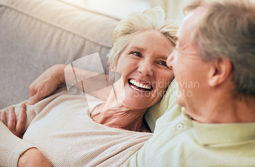 Image of Love, smile and relax with old couple on sofa for affectionate, bonding and happiness. Retirement, trust and marriage with man and woman in living room of home for support, quality time and peace