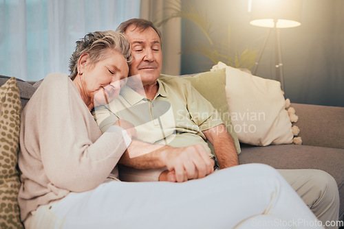 Image of Senior couple, eyes closed and relax on living room couch for comfortable afternoon nap, easy lifestyle and retirement at home. Love, care and sleeping old couple on lounge sofa together in apartment