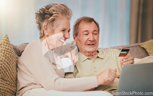 Image of Elderly, couple with credit card for online shopping and e commerce with laptop, internet and banking. Retirement, money and payment, senior man and woman happy at family home, savings and payment.