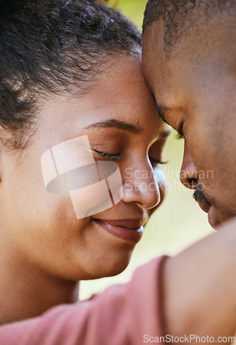 Image of Face, love and happy with a black couple hugging together outdoor for romance, dating or relationship. Smile, trust and safe with an attractive young woman and man bonding outside with a hug