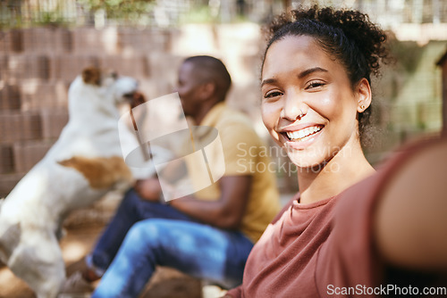 Image of Black woman, selfie and dog adoption with happiness and love with family outdoor. Puppy, pet and woman portrait in the sunshine happy about bringing animal to its new home in summer with a smile