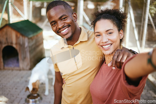 Image of Love, dog or couple of friends take a selfie at an animal shelter or adoption center for homeless dogs. Pets, face portrait or black woman with a fun black man taking pictures as a happy black couple