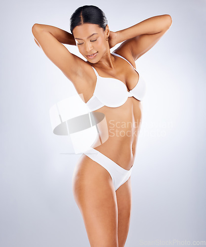 Image of Black woman, beauty and body in underwear for sexy lingerie, healthy diet or skincare against studio background. Attractive fit female model in health, wellness and nutrition with slim body lifestyle