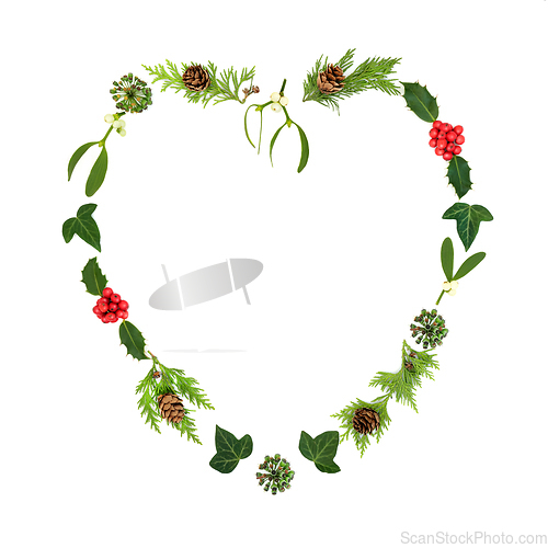 Image of Christmas Heart Shape Wreath and Traditional Winter Greenery