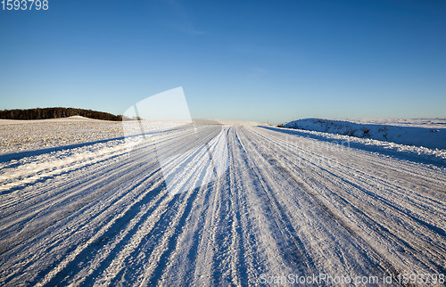 Image of winter time on a narrow rural highway