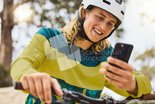Image of Social media, gps and man on a bike in nature, fitness cycling and search for location on a phone in the mountains of Indonesia. Contact, communication and person with a mobile on a bicycle in a park