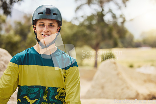 Image of Happy man, nature and sports helmet for cycling outdoor for mountain bike training fitness, exercise and workout for travel and freedom. Portrait of athlete male ready for marathon with safety gear