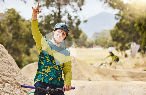 Image of Mountain bike, cycling man and celebration for race, contest and winning on fast adventure in nature. Bicycle sports, rider portrait and success at sport event, competition and winner in sunshine