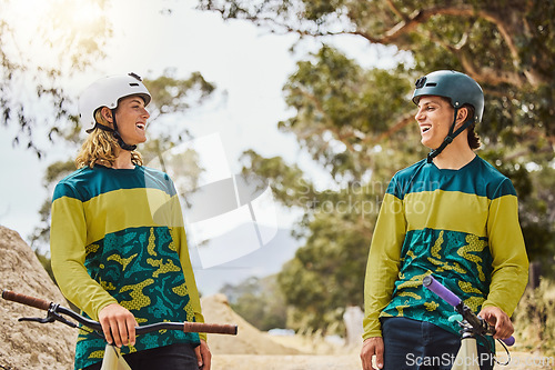 Image of Bike, fitness or sports cycling friends laughing at a funny joke in training, exercise or workout in safety helmets. Partnership, bicycle or happy young men talking or bonding in nature adventure