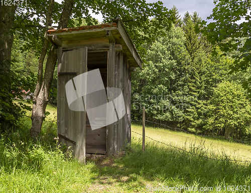 Image of wooden pit latrine