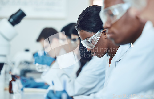 Image of Study, research and scientist team in a lab for medical, innovation and drug analysis, health and medicine. Science, healthcare and doctors in room for clinical, drug and trial planning in laboratory