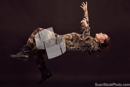 Image of Anxiety, soldier and woman in studio for war ptsd, nightmare and horror, mental health and depression on black background. Military, flashback and girl in army crisis, trauma and fall Ukraine veteran