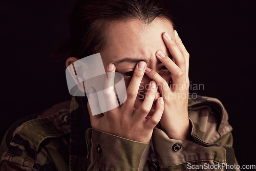 Image of Military woman, mental health and crying in studio for depressed, anxiety and stress in war clothes. Female soldier, sad ptsd or trauma memory from army by black background with depression in Ukraine