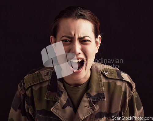 Image of Trauma, scream and woman soldier with ptsd, military depression and mental health problem on black background of Ukraine war. Horror, anxiety and portrait of scared female army veteran shout in fear