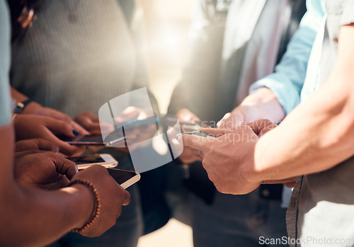 Image of Phone, group or hands networking on social media, mobile app or social network while streaming online digital content. Community, ui or students sharing data, music or internet news in a circle