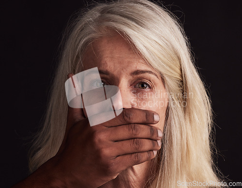 Image of Woman, portrait and hand on mouth for silence, abuse or violence for danger, depression or fear in studio. Black man, force hands or stress on face for horror, domestic violence or sexual harassment